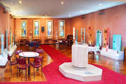 The Baptistry Chapel is situated below the gallery.  At centre is the font, on either side are displays about the Cathedral, and at the rear are stained glass windows and other items of interest.