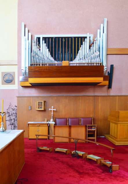 The organ was built by George Croft and Sons in 1974.  It had three manuals, pedal boards, 53 speaking stops, 15 couplers and almost 3000 pipes.  [19]