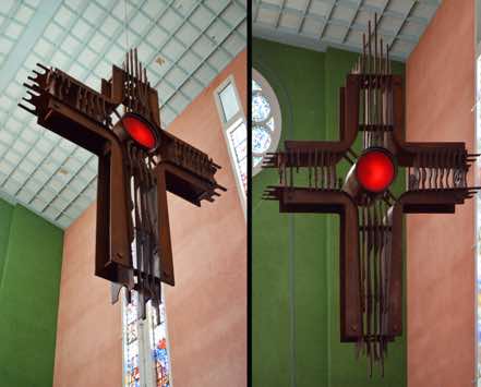 The Cross above the altar was designed and made of wood and glass by Brian Grouden of Havelock North, in 1975.  The red centre suggests the eternal presence of God (suggestive of a sanctuary light).  Viewed from the front, the Cross appears empty; from the side, the outline of the crucified Christ is suggested.   [17]   This completes our tour of the Cathedral.  But there is a little more ...