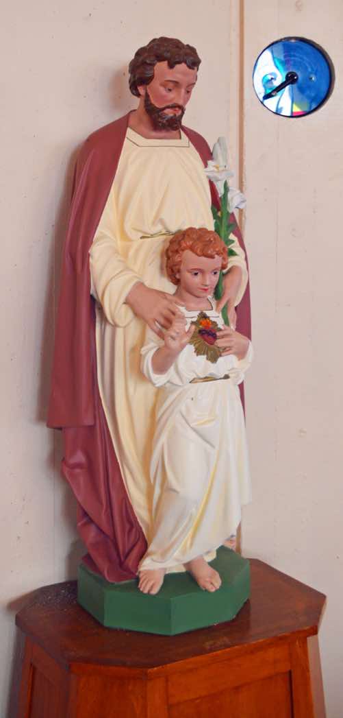 Joseph is often pictured holding a flowering lily.  This refers to an old legend in which an angel appeared to the men of the village and announced that the one whose staff sprouted would be the ‘father’ of the Messiah.